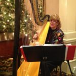 Barbara playing at the Denver Country Club holiday party.