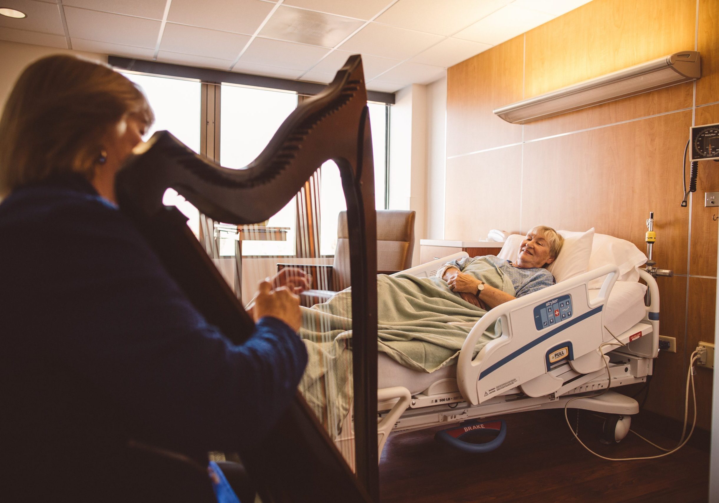 Denver Harpist Barbara Playing Therapeutic Music for Patient